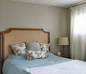 Photo courtesy of Courtney Guggenberger of coffeewithcake.com. This bedroom uses neutral hues, specifically gray, to highlight the blue accents.