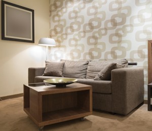 Wallpaper is no longer reminiscent of the ‘70s, as bold, geometric wallpaper now provides a unique focal point in a room.