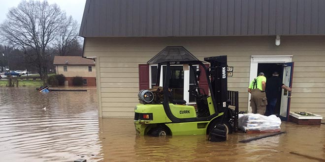 Volunteers Help Retailer Flooding
