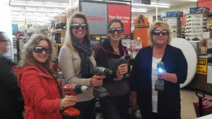 Women show off their power tools skills they acquired at the Skill Builders Series.